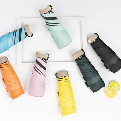 Viaje con estilo con Super Mini Pocket Anti UV Paraguas de oro de metal de fibra de vidrio costillas
