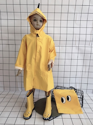 Pañuelo de lluvia transparente para niños de dinosaurios pequeños en el jardín de infantes y el grado 1-3