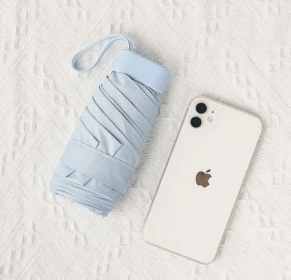 Protección UV con un bolsillo pequeño para llevarlo fácilmente en días soleados