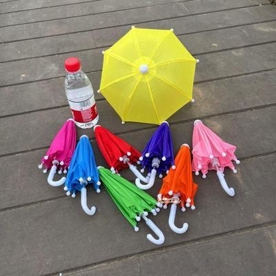 Manual de paraguas para teléfonos celulares abiertos de tamaño pequeño para ciclismo al aire libre Protección contra lluvia y viento