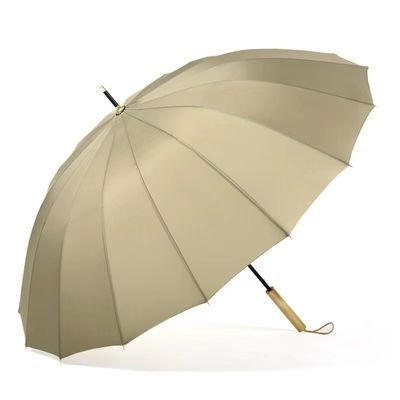 Arco de fibra de vidrio 16K Gran Paraguas de golf amarillo a prueba de viento con mango de madera recta