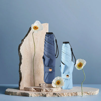 Protección UV Paraguas de fibra de carbono para adultos ligero y portátil triple plegado