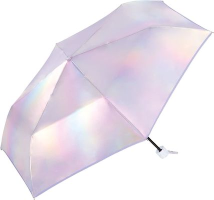 Un paraguas imperdible para las mujeres urbanas con protección UV y diseño láser fino