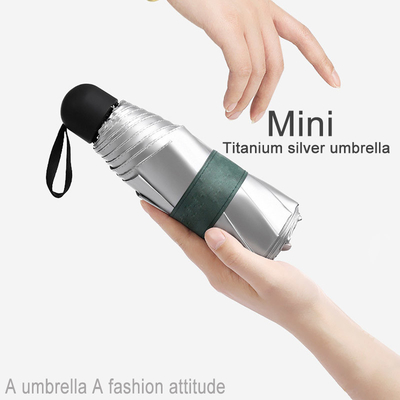 Mini sombrilla manual de bolsillo con logotipo personalizado y costillas de fibra de vidrio de aluminio