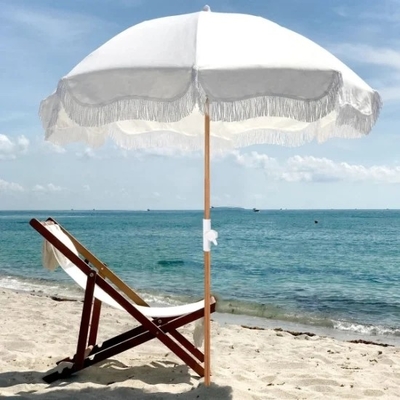 Paraguas de playa con flecos de algodón y función todo en uno